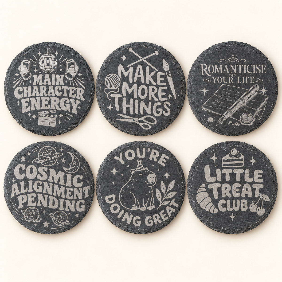 Six engraved round slate coaster designs by M&L Studio