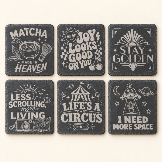 Six engraved square slate coaster designs