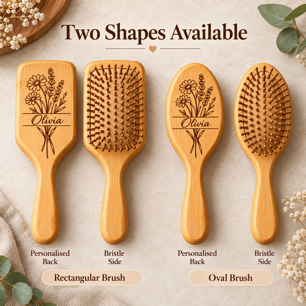 Two personalised bamboo hairbrush shapes with floral engraving