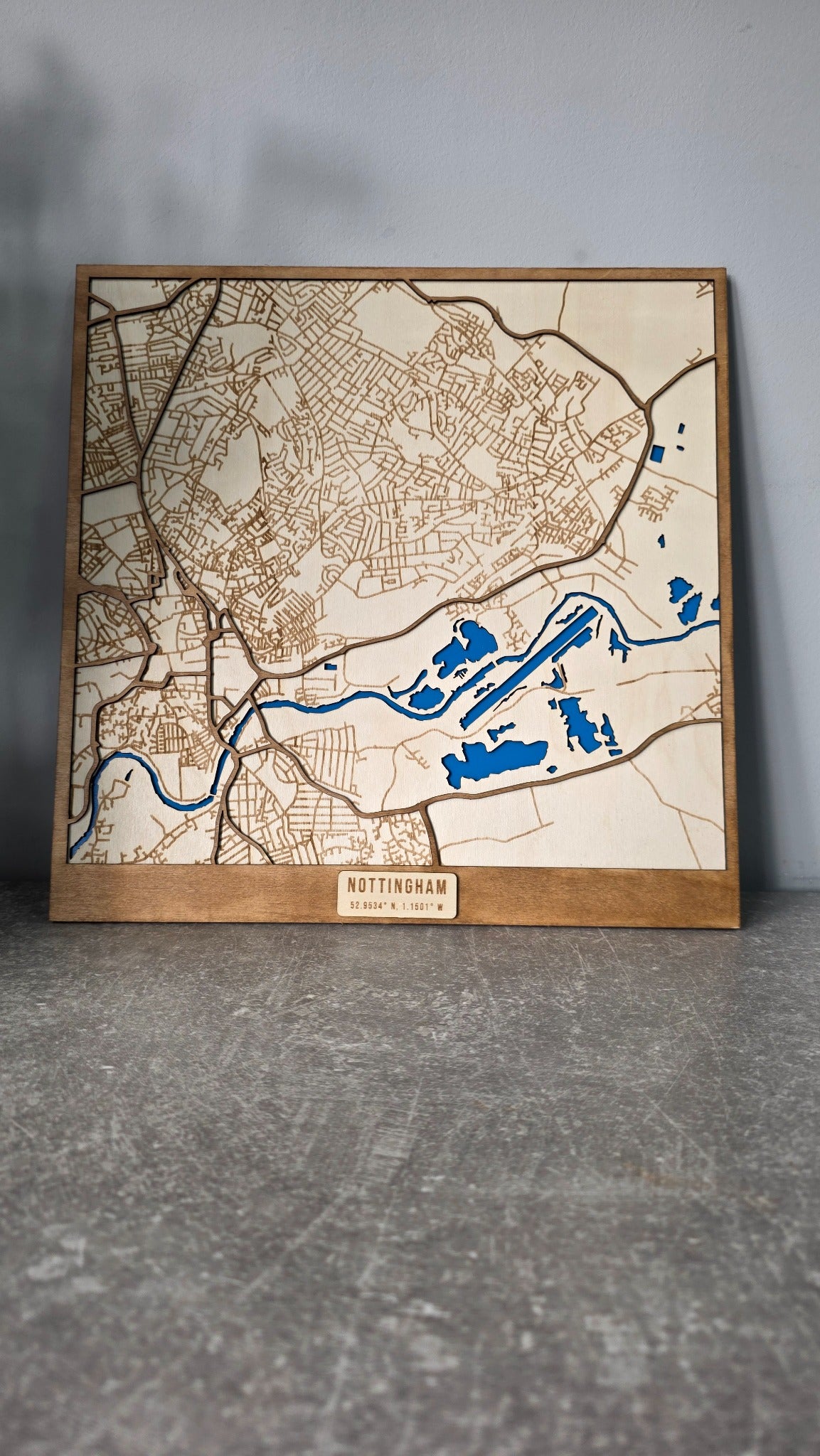 Wooden engraved Nottingham street map pictured vertically